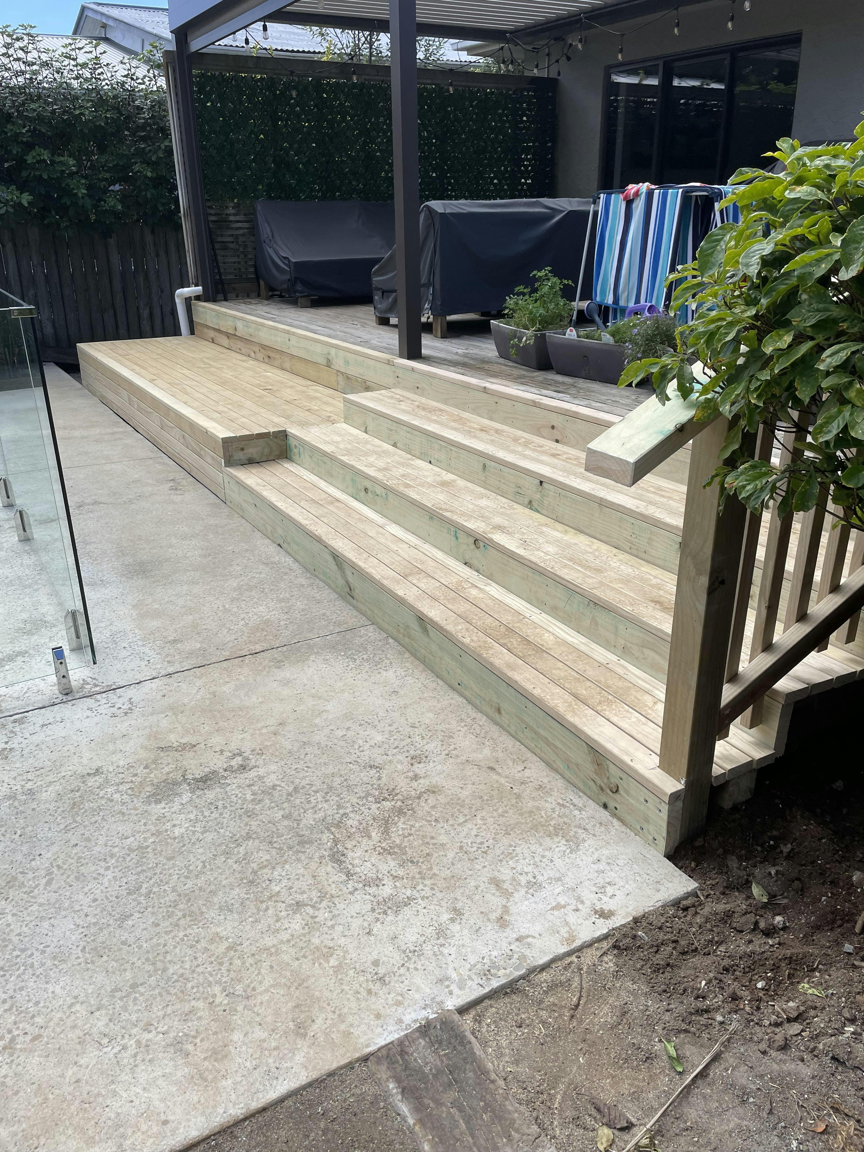 brand new deck around pool in a home in the north shore. best fence contracter in auckland